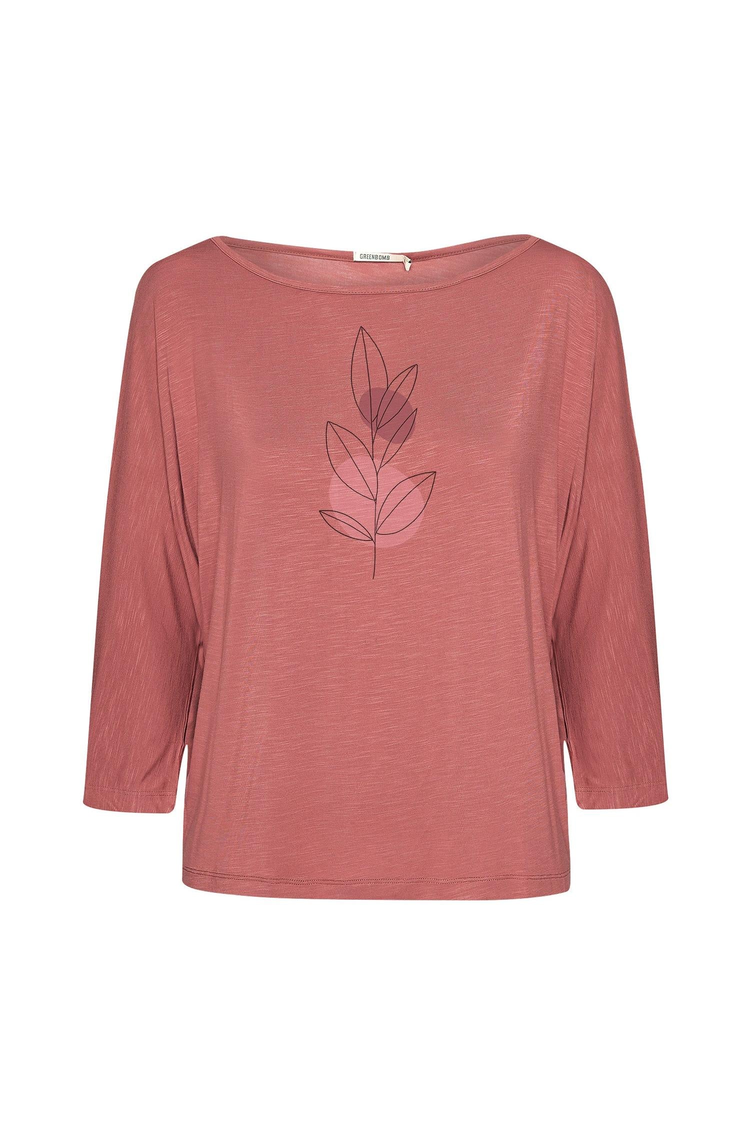 Greenbomb pink blouse with a leaf design on a white background