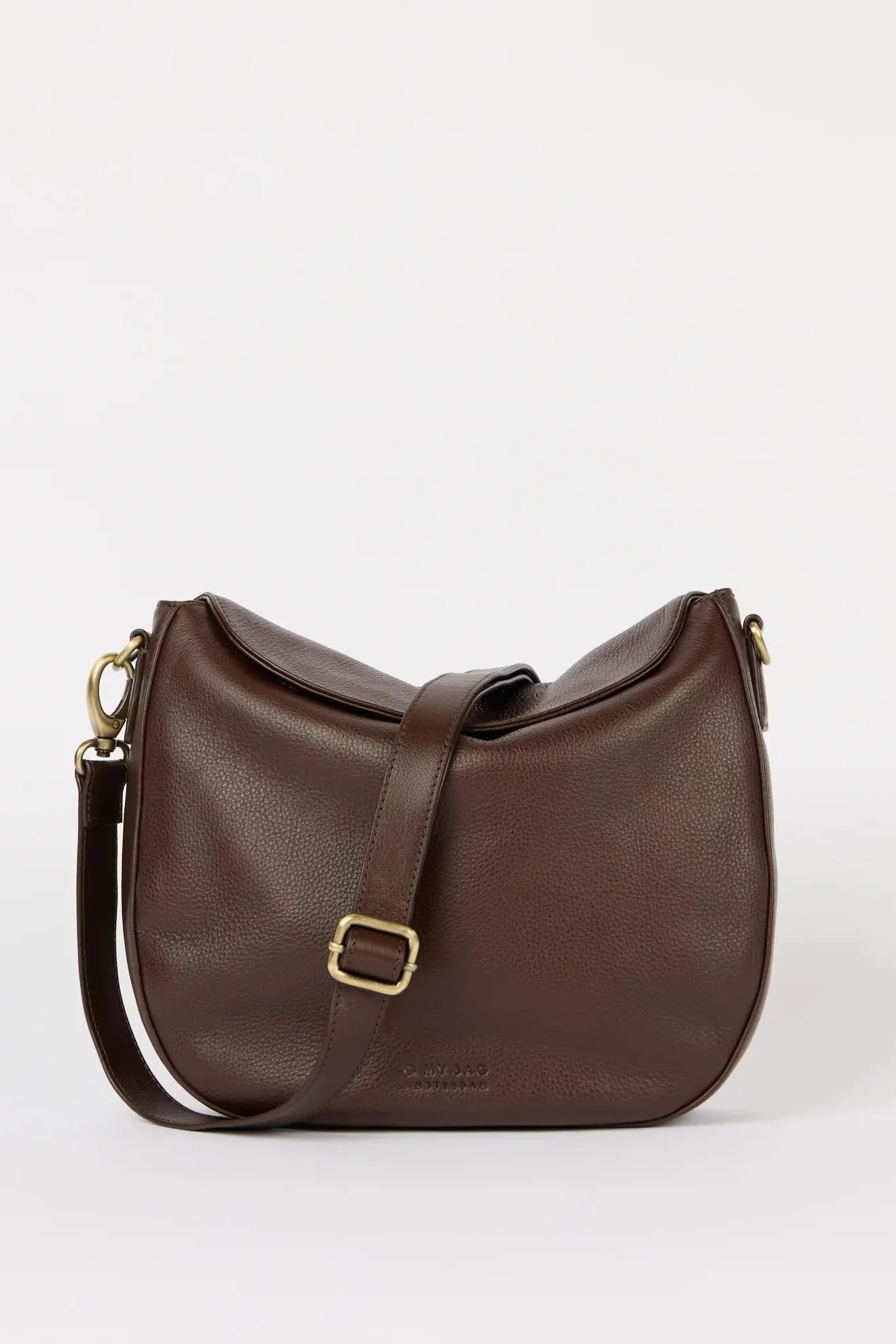 Brown leather handbag with gold buckle on a white background
