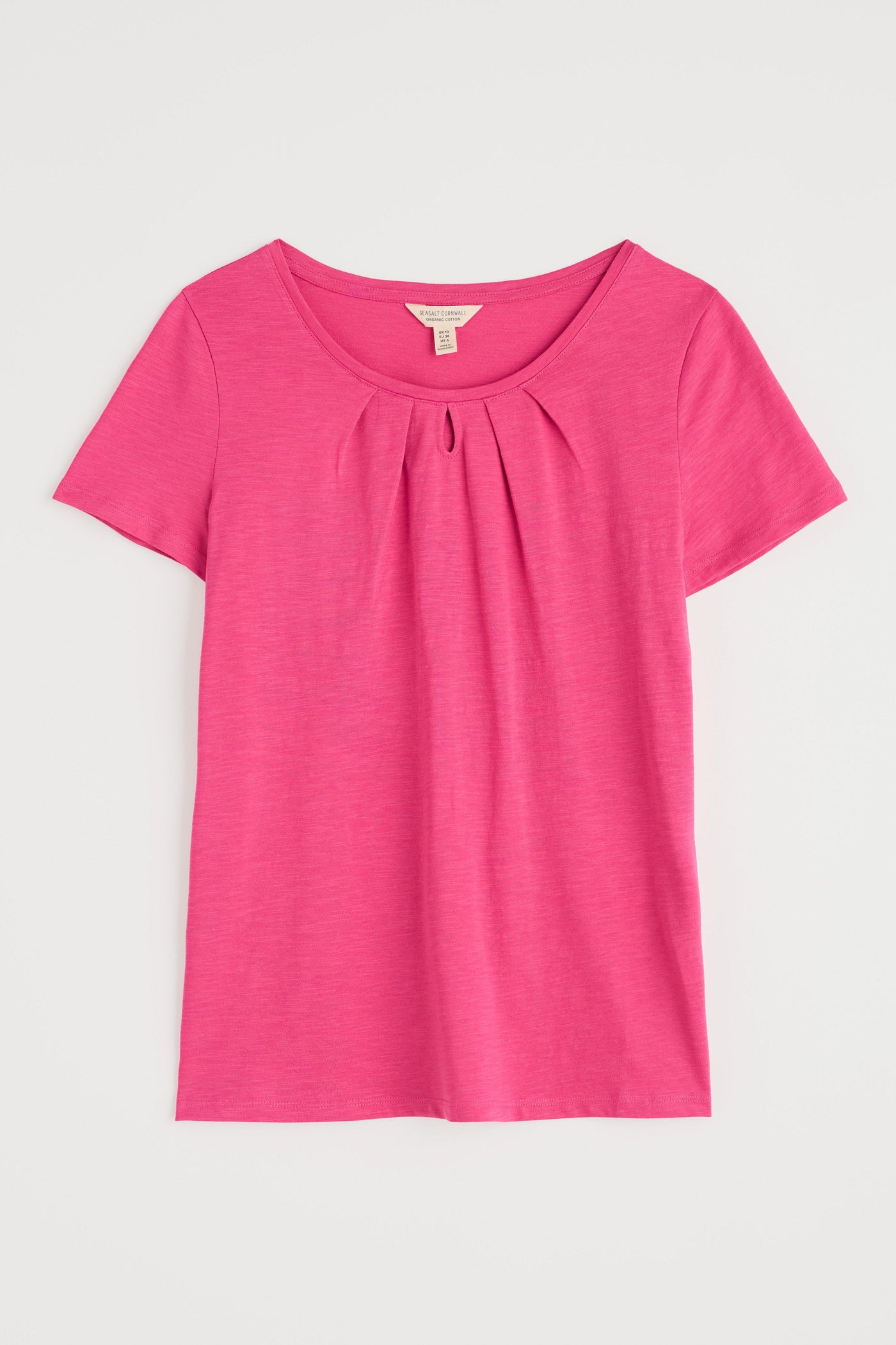 Flat lay of the Seasalt Appletree T-shirt, showing scoop neck and pink fabric.