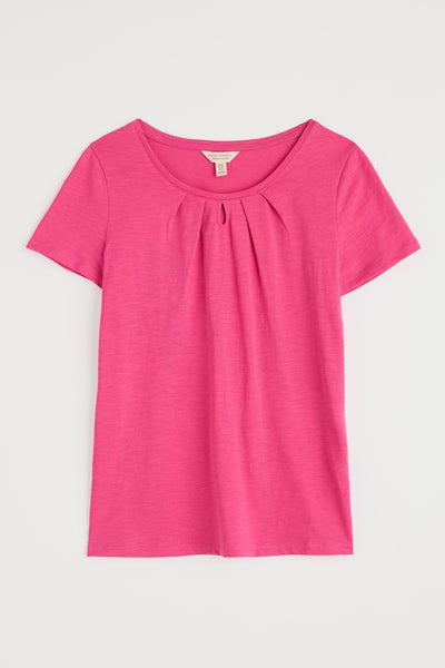 Flat lay of the Seasalt Appletree T-shirt, showing scoop neck and pink fabric.