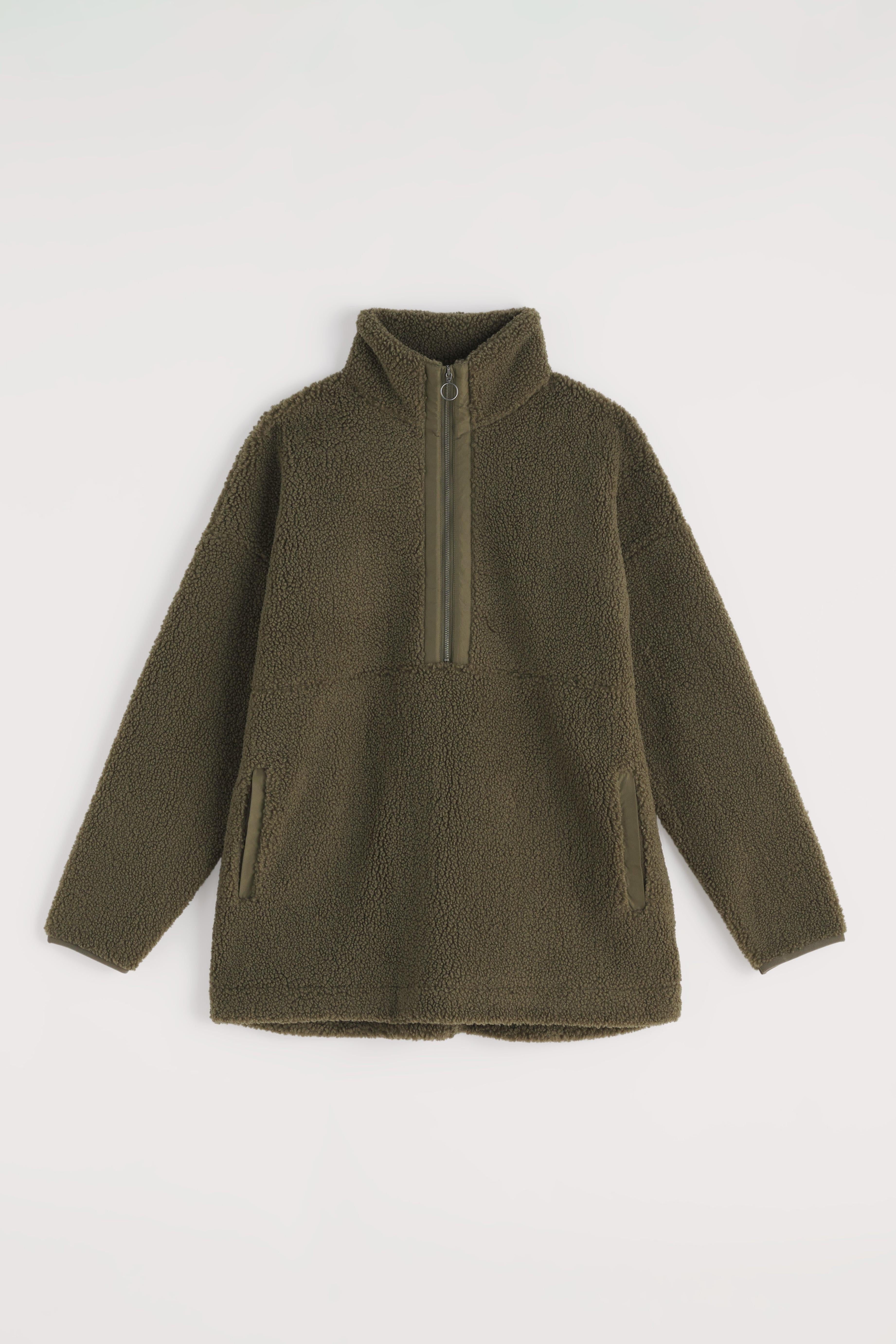 Green fleece pullover on a white background