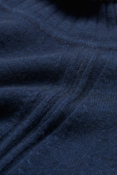 Close-up of a blue wool fabric texture