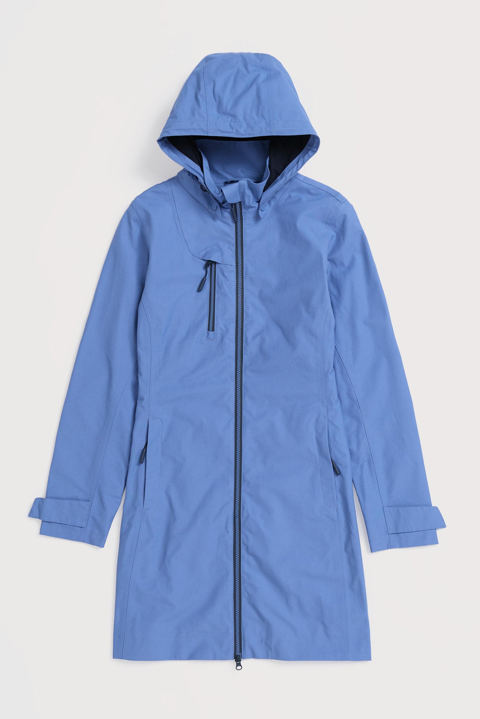 Blue raincoat with a hood on a light gray background