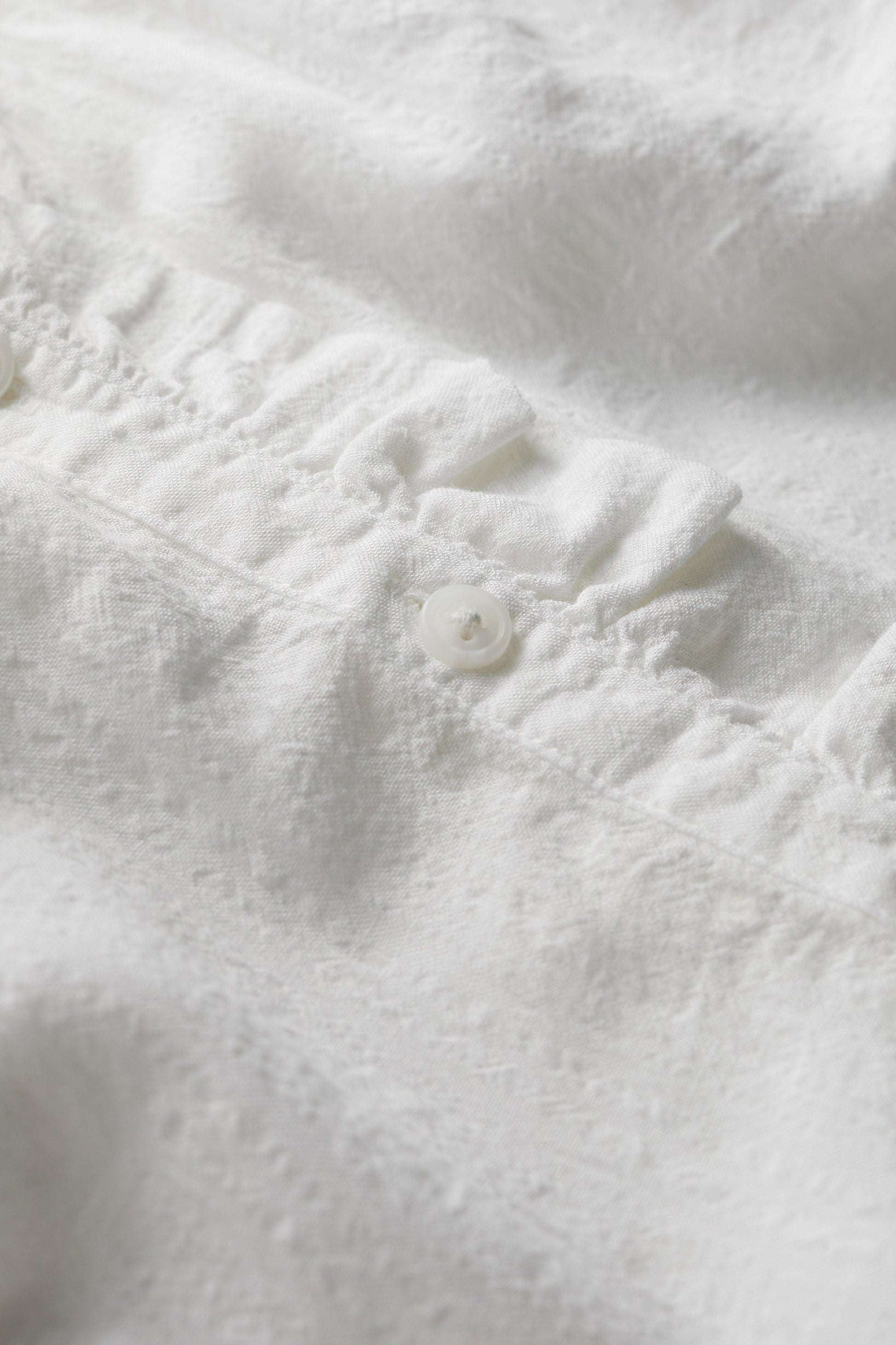Close-up of white organic cotton fabric 