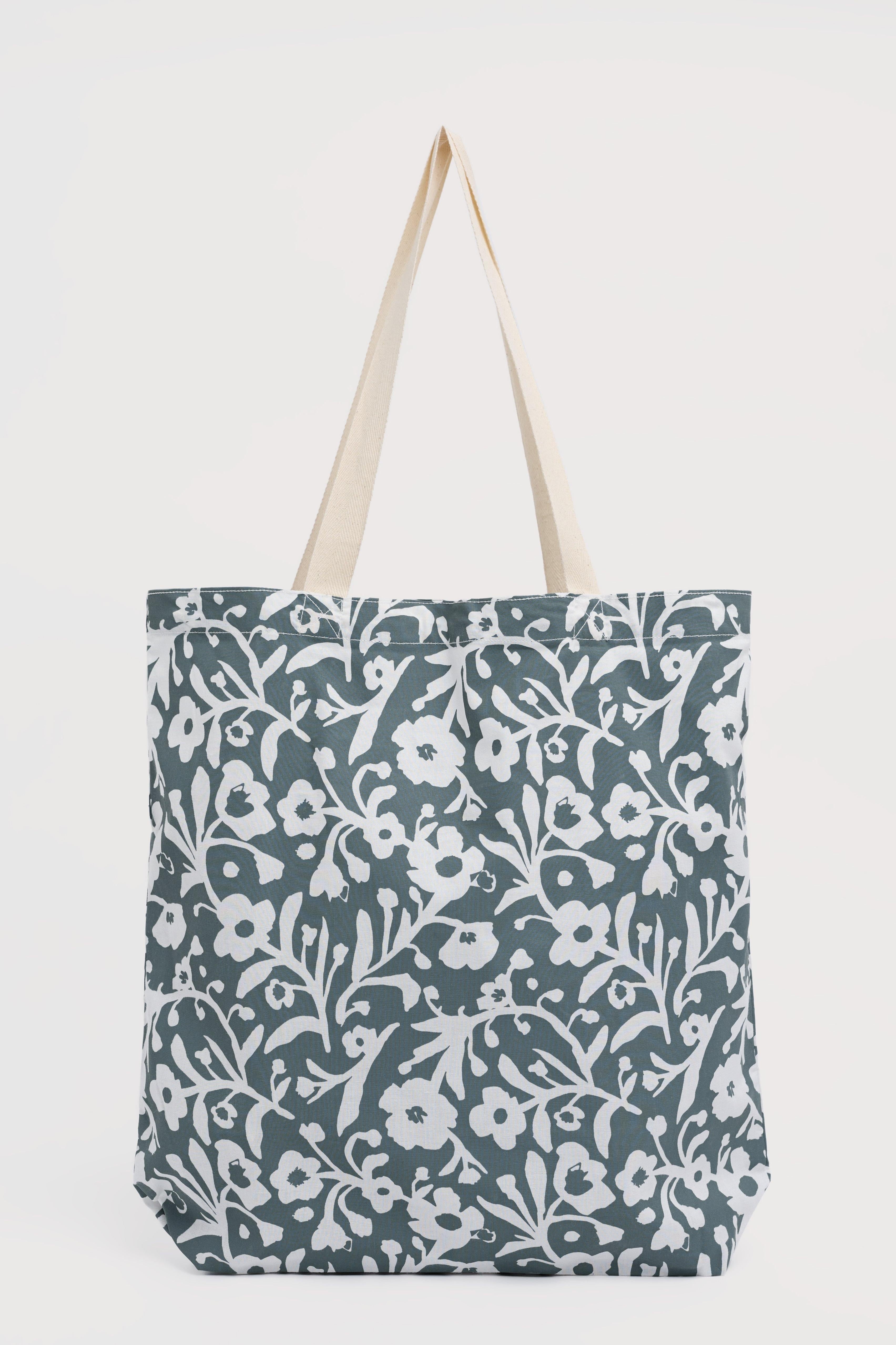 Tote bag with floral pattern on a white background