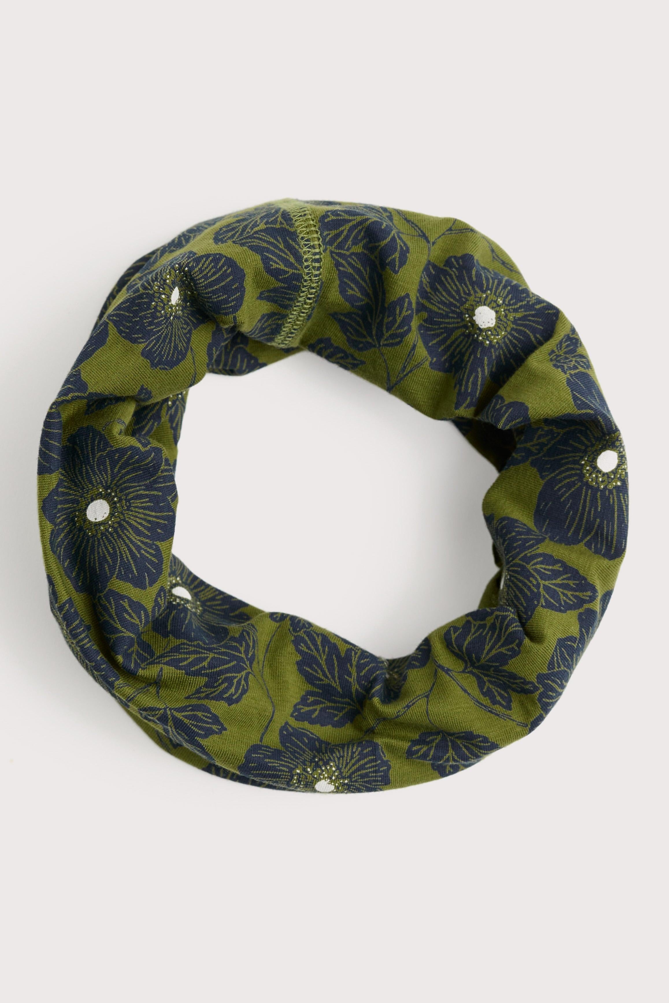 Green floral patterned snood with button details on a white background