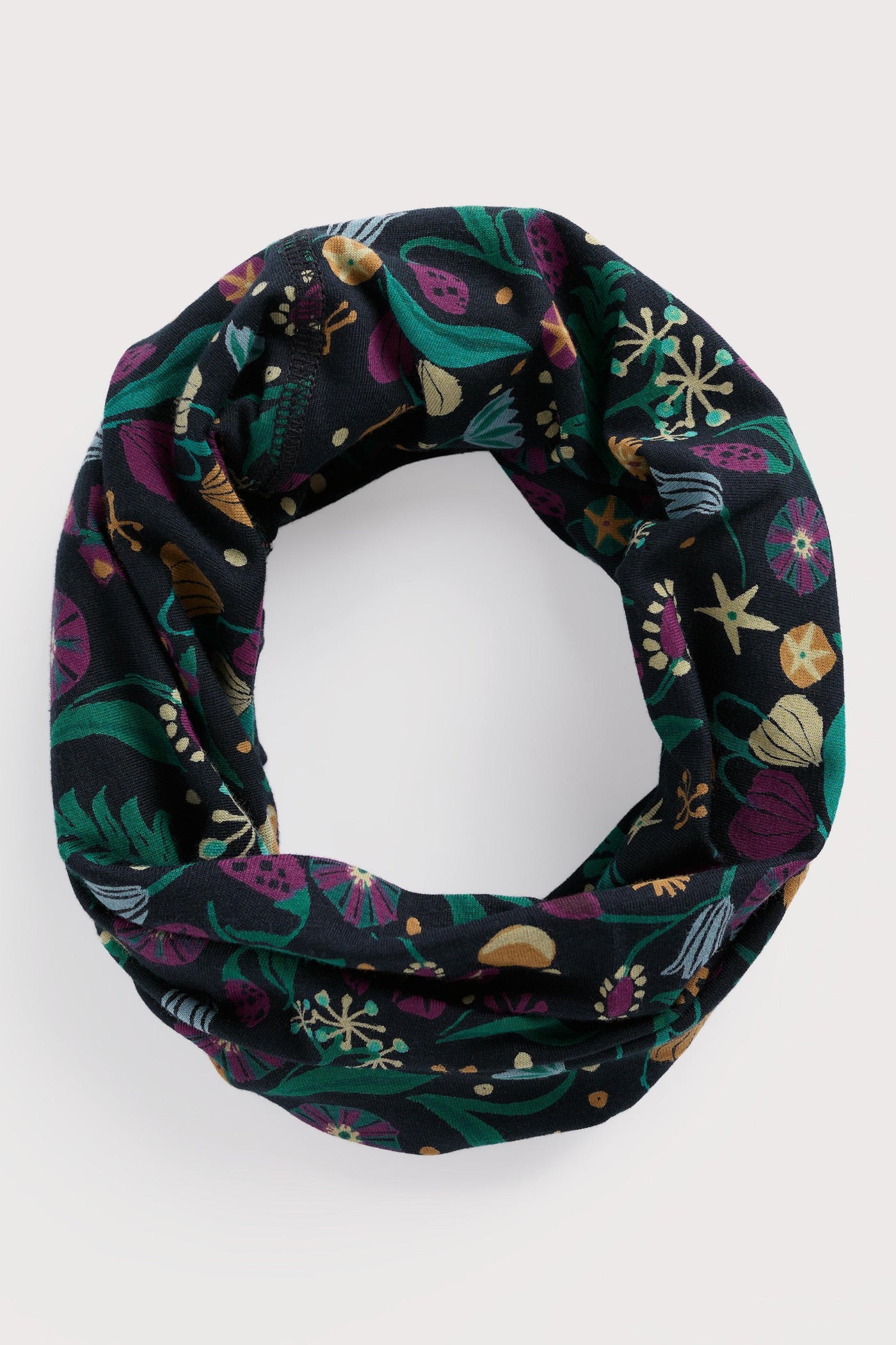Floral patterned neck warmer on a white background