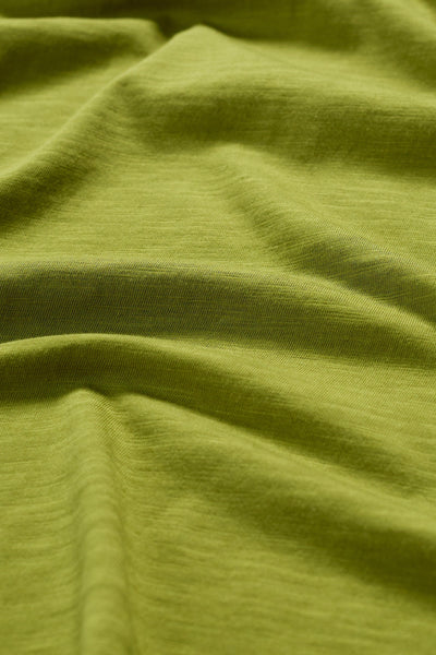 Close-up of the Seasalt Kellow T-Shirt fabric in Dark Citron, showing texture and stitching details.