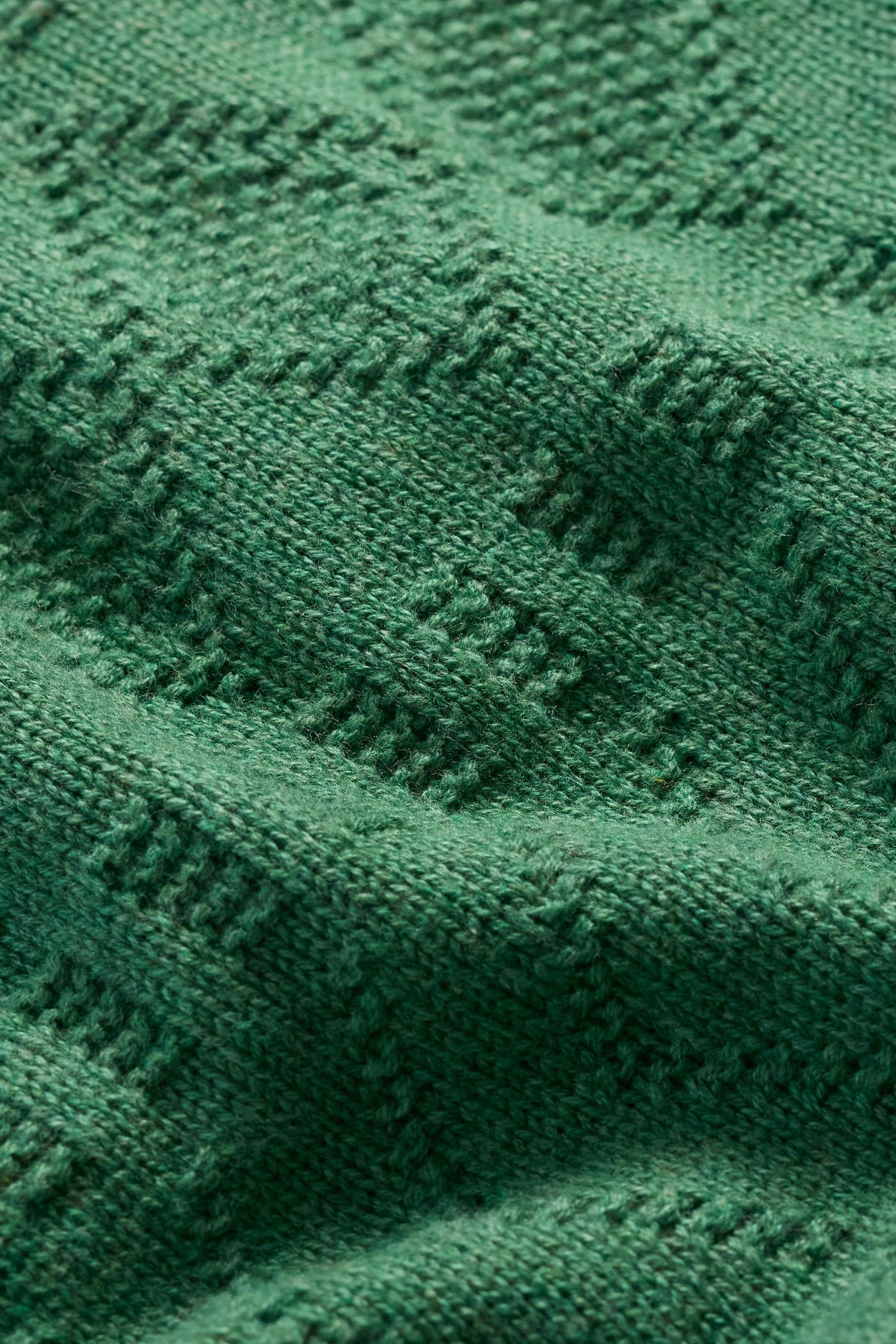 Close up of organic cotton fabric and stitching detail.