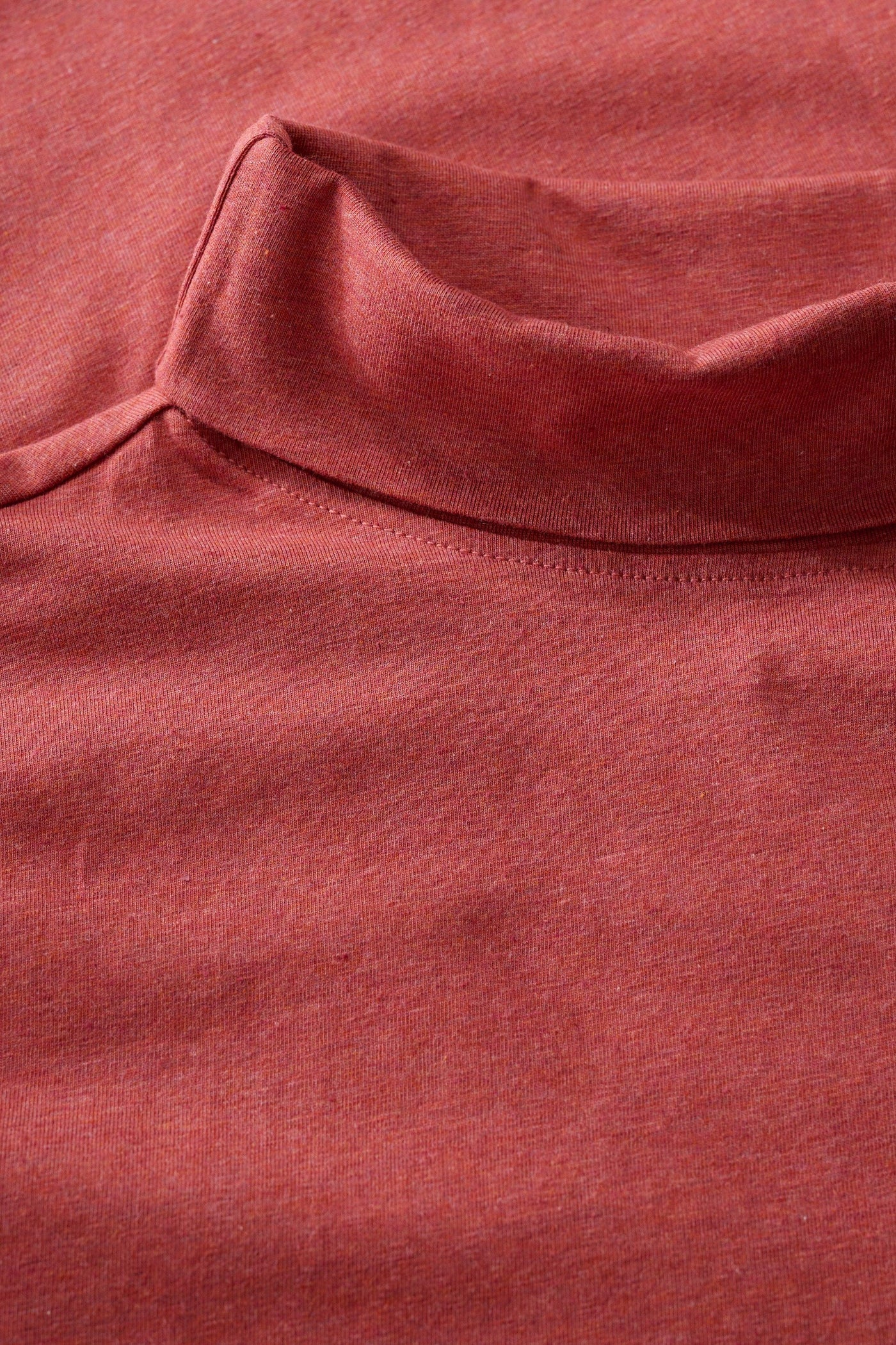 Close-up of a textured red fabric surface