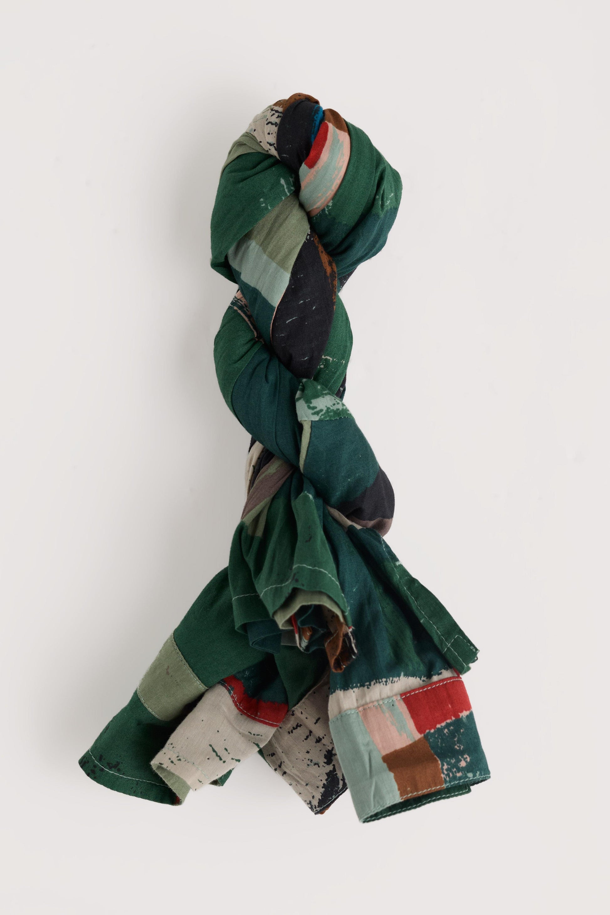Colorful knotted fabric on a white background