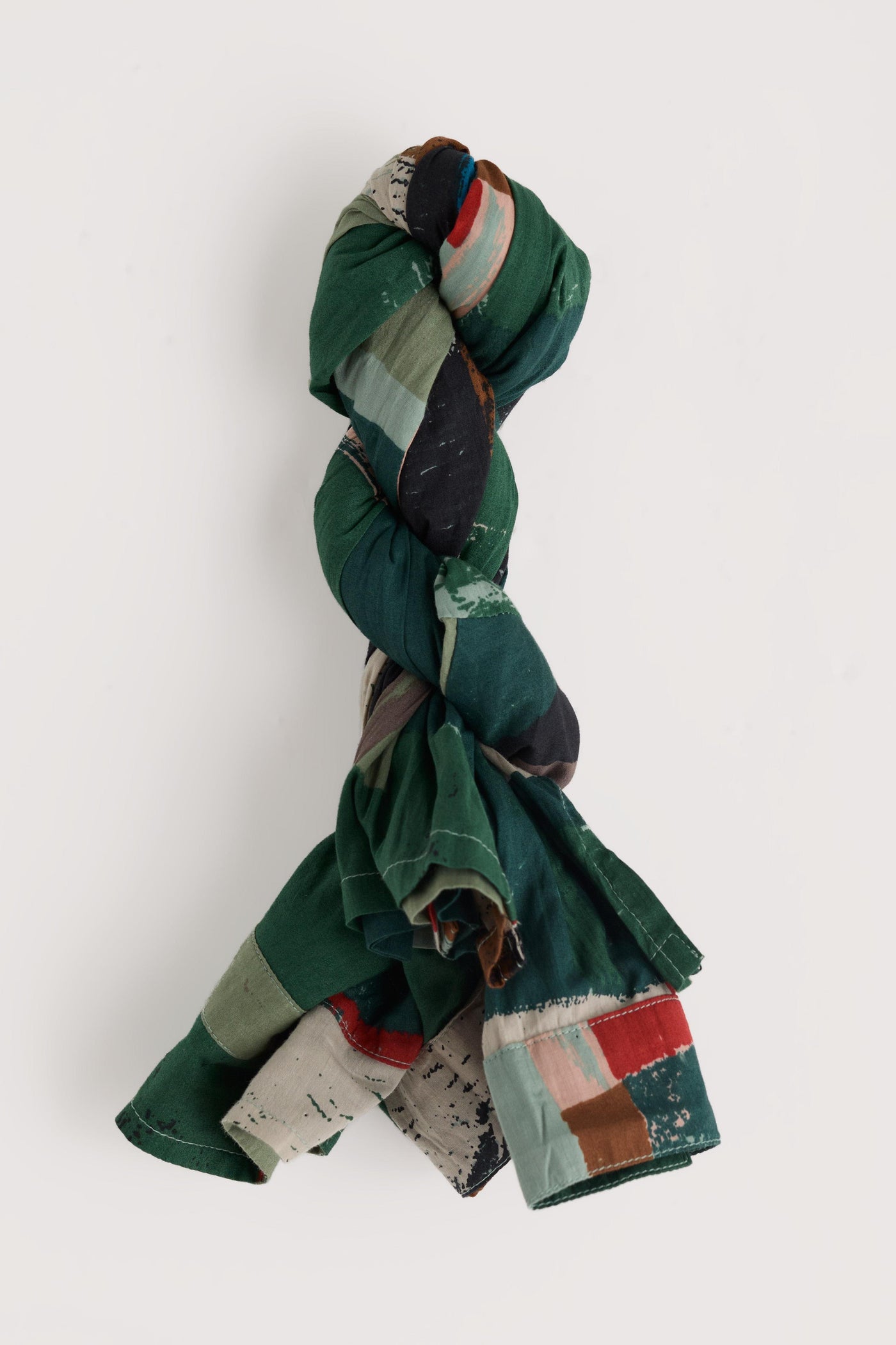 Colorful knotted fabric on a white background