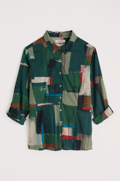 Multicolored patchwork organic cototn shirt on a white background