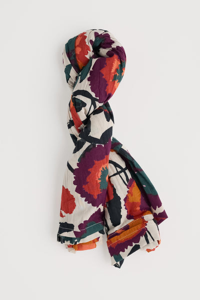 Colorful floral-patterned shirt on a white background