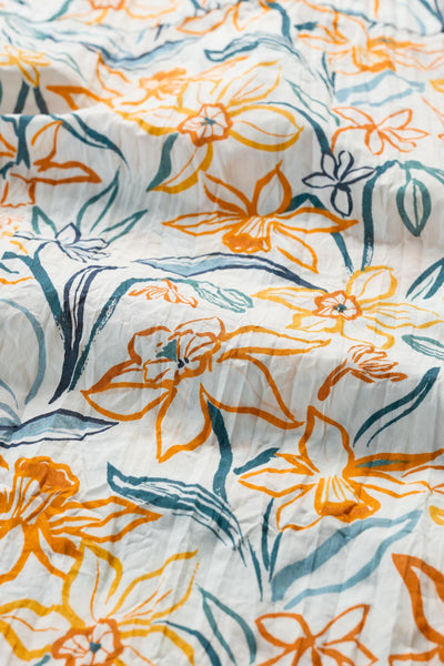 Close-up of the shirt's intricate floral pattern.