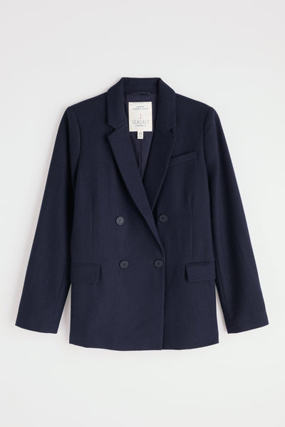 Navy blue wool blazer on a white background