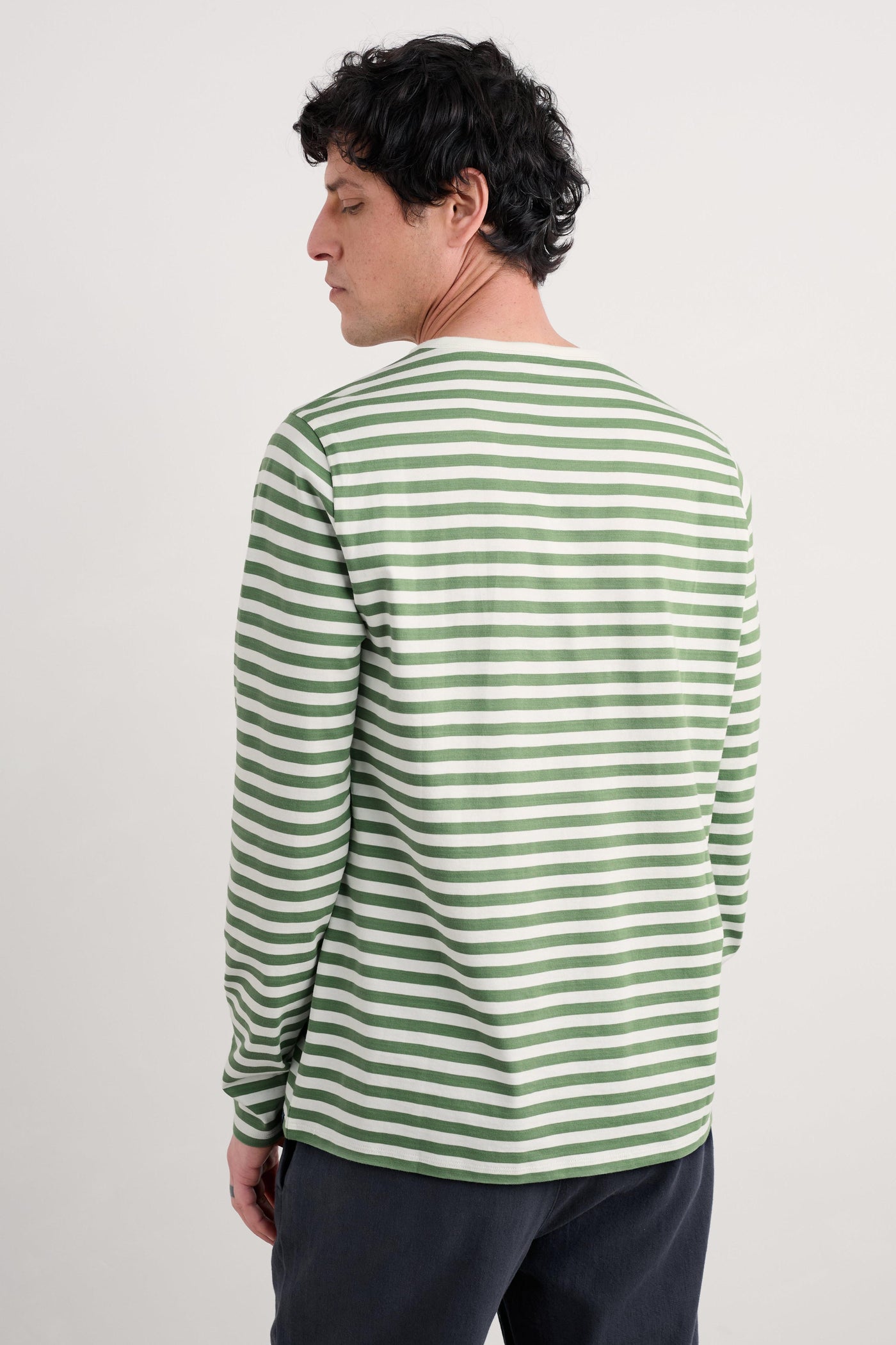 Rear view highlighting the consistent stripe pattern and relaxed fit of the shirt.