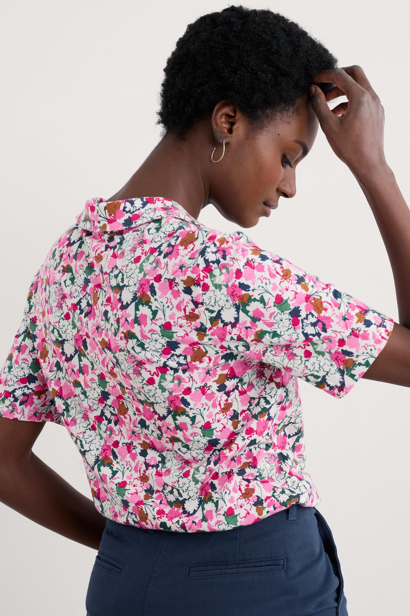 Side profile of the shirt showcasing the soft drape of the organic cotton and modal blend fabric.