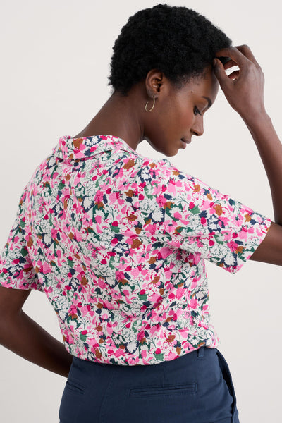 Side profile of the shirt showcasing the soft drape of the organic cotton and modal blend fabric.