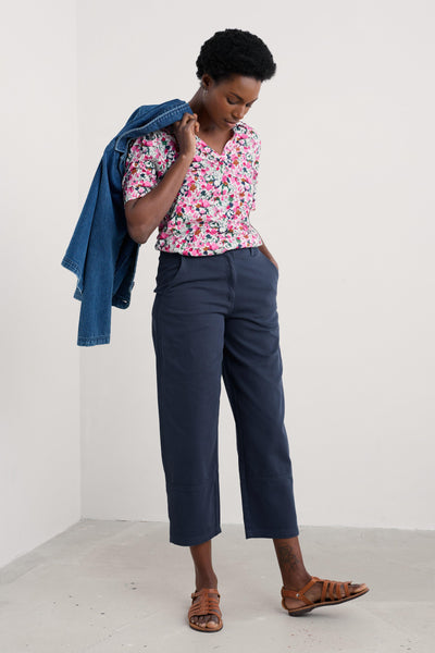 Model styled in the Misty Sky Shirt paired with navy trousers.