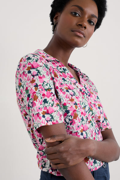 Close-up of the shirt's intricate floral pattern.