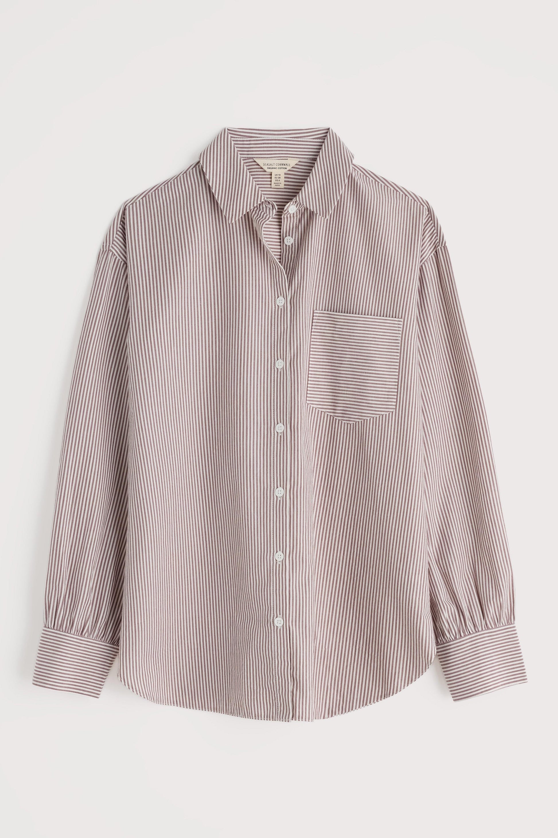 Striped shirt with a pocket on a light gray background