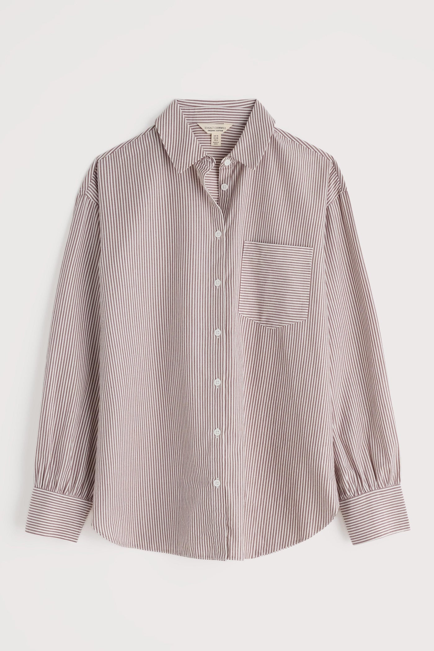 Striped shirt with a pocket on a light gray background