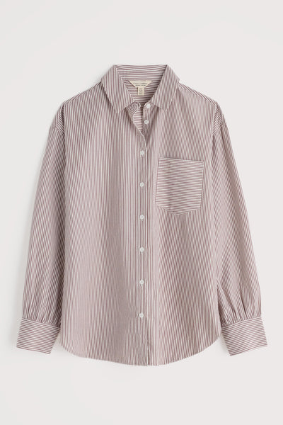 Striped shirt with a pocket on a light gray background