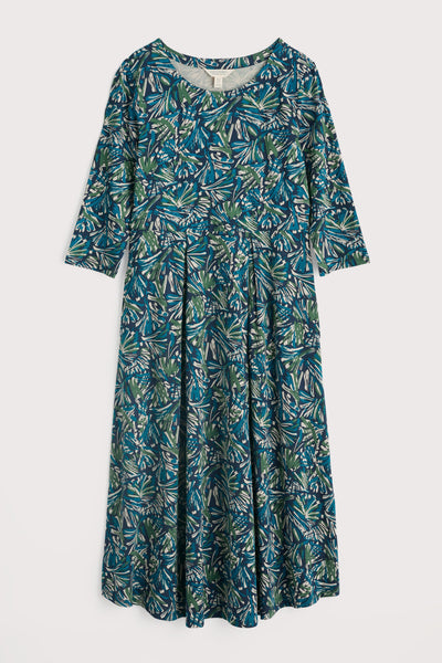 Blue patterned dress on a white background