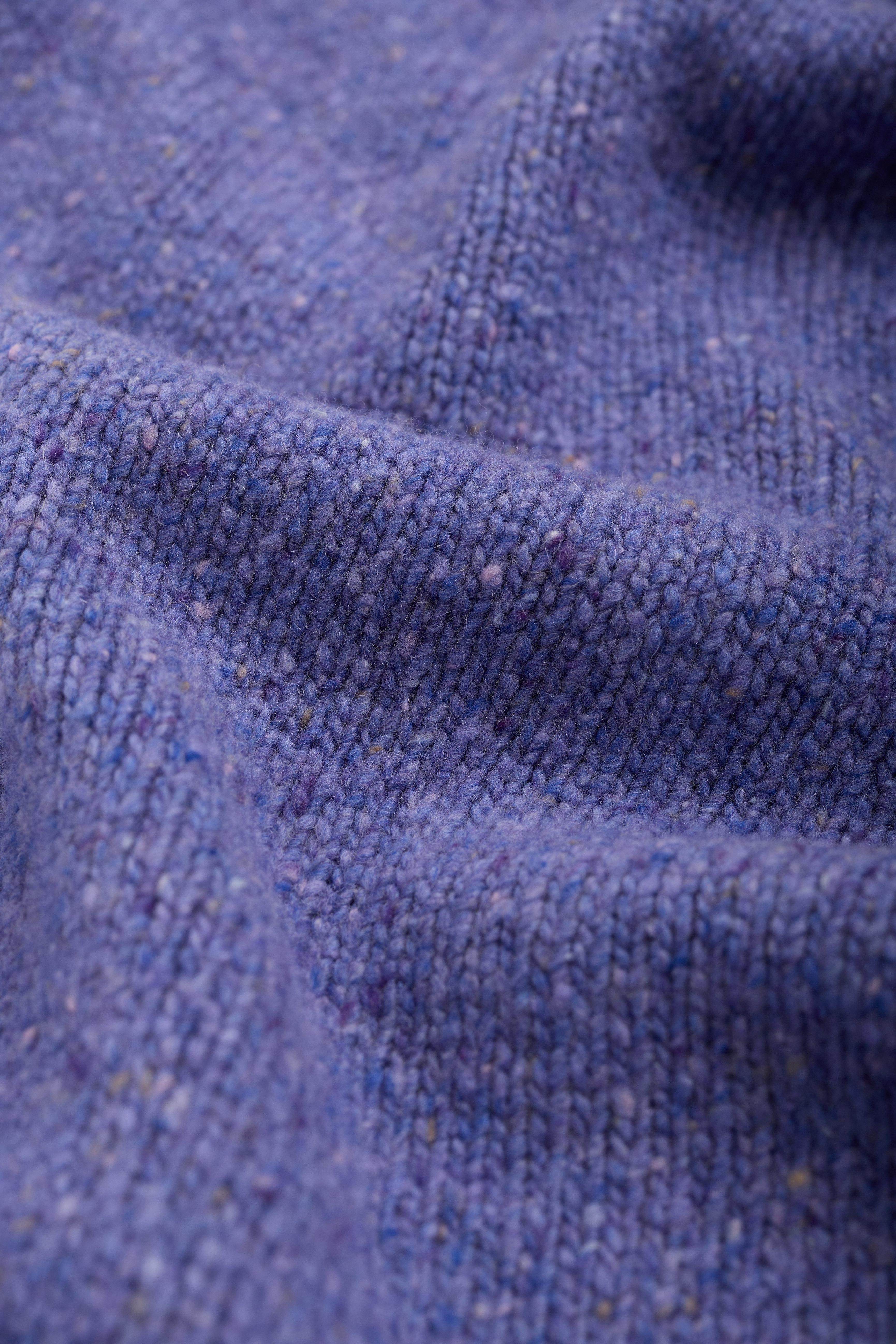 Close-up of purple wool fabric texture