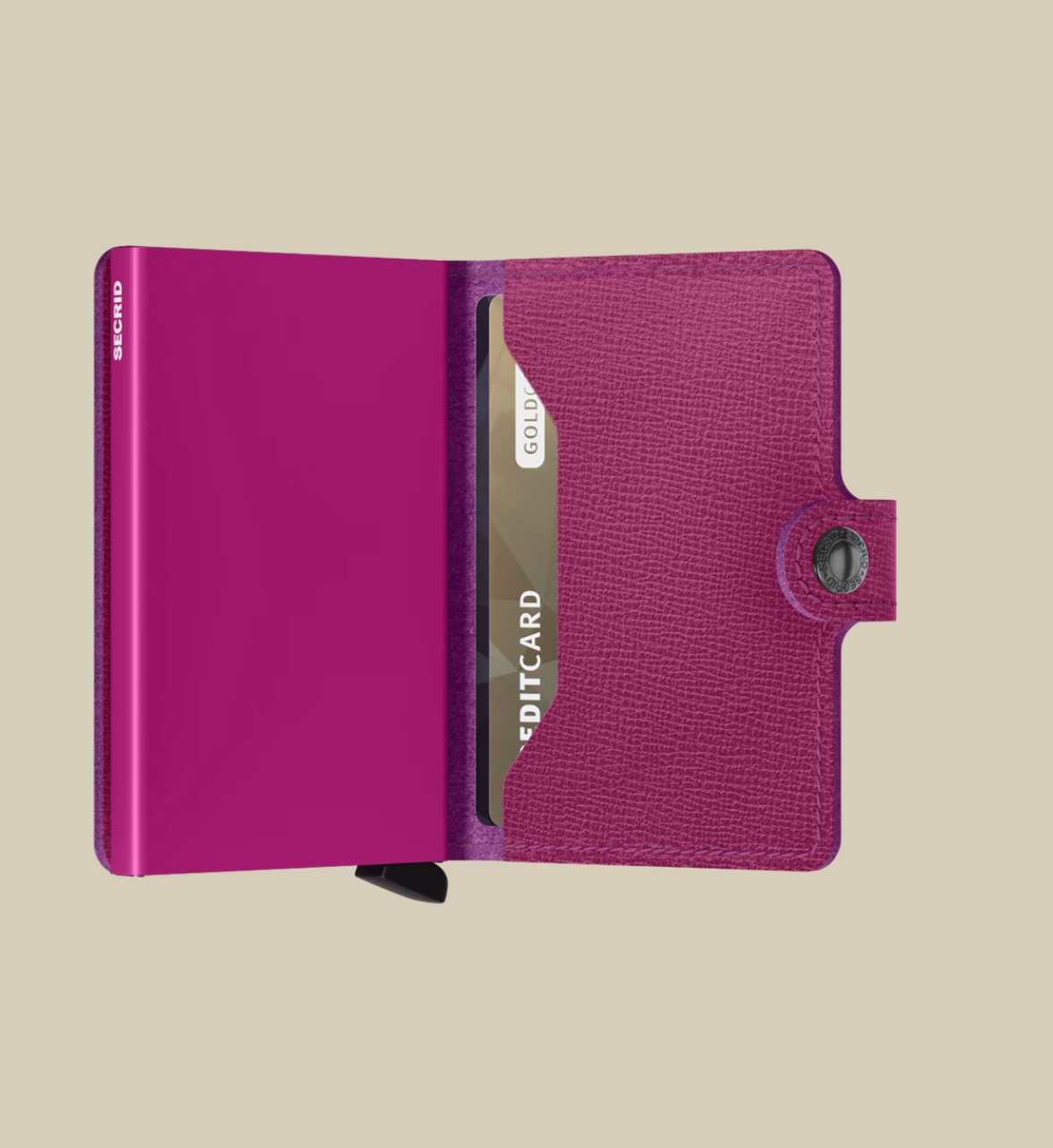 Purple cardholder with visible brand name on a beige background
