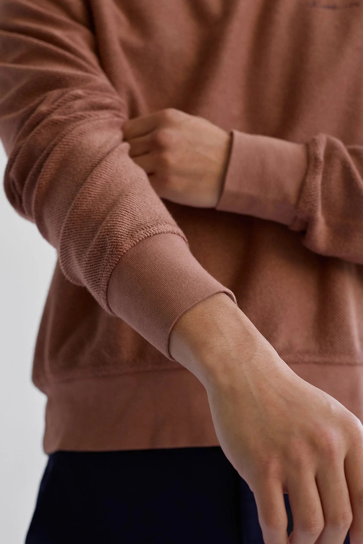 Close-up view of the cuff on organic cotton sweatshirt.