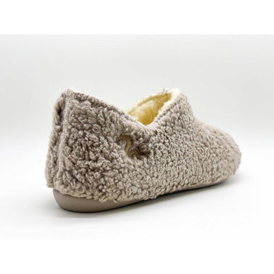Beige organic cotton slipper with sherpa lining on a white background