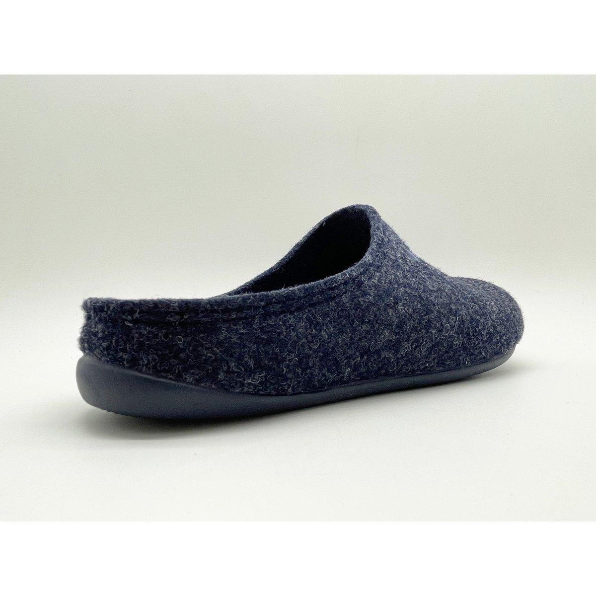 Navy blue slipper on a light gray background