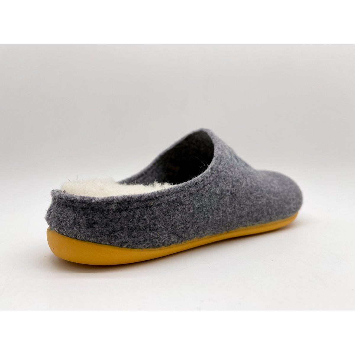 Gray wool slipper with yellow sole on a white background