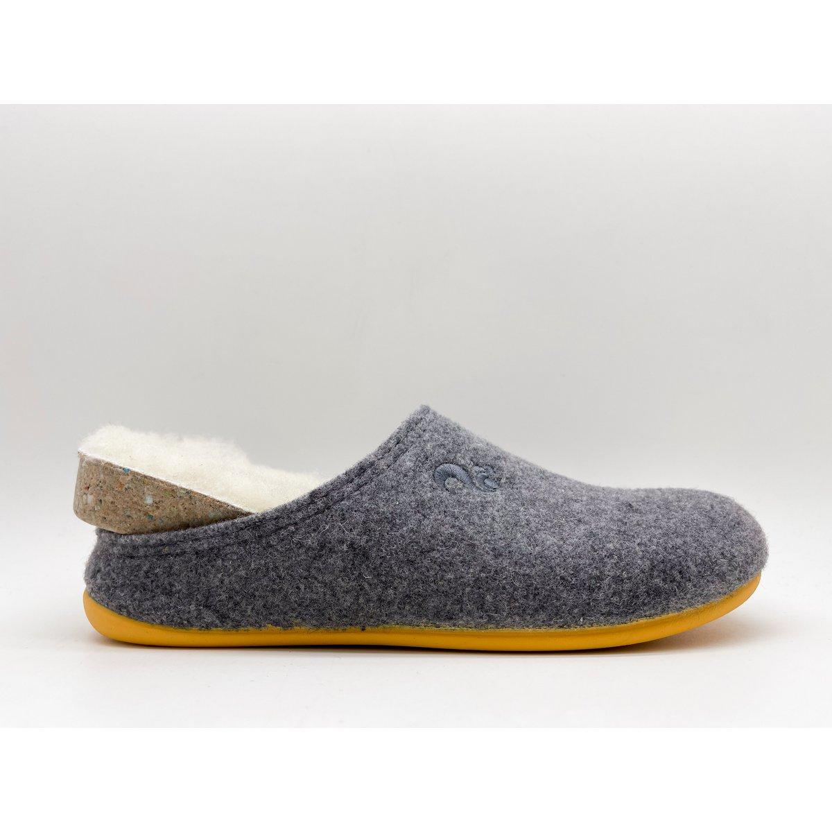 Gray wool slipper with white lining and yellow sole on a light gray background