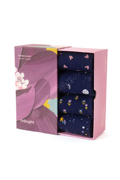 Giftbox of socks with star and moon pattern in a pink box with floral design