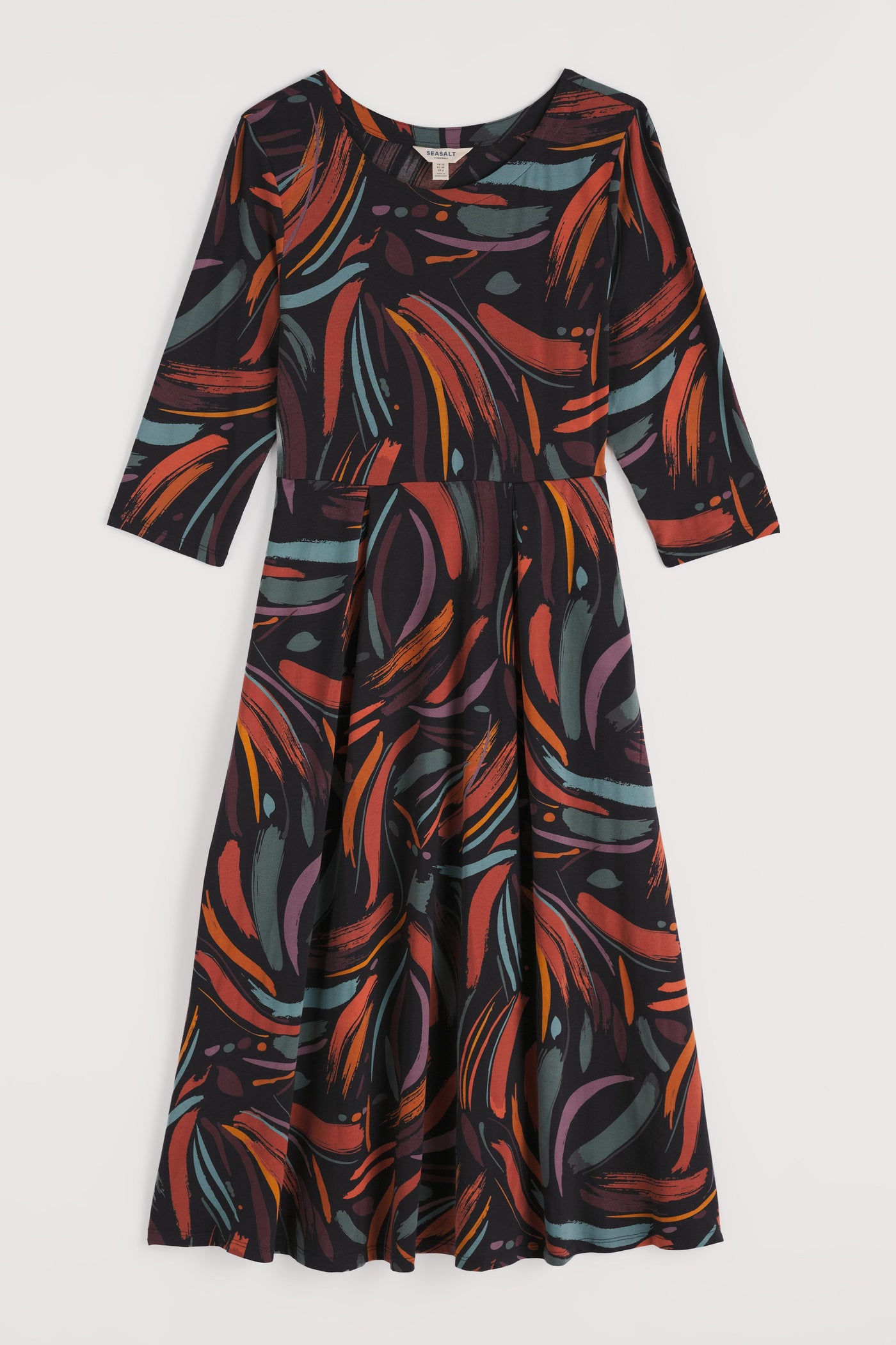 Colorful patterned organic cotton dress on a white background