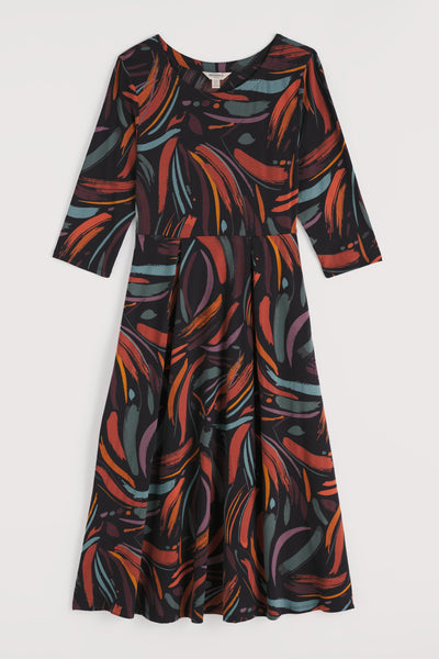 Colorful patterned organic cotton dress on a white background