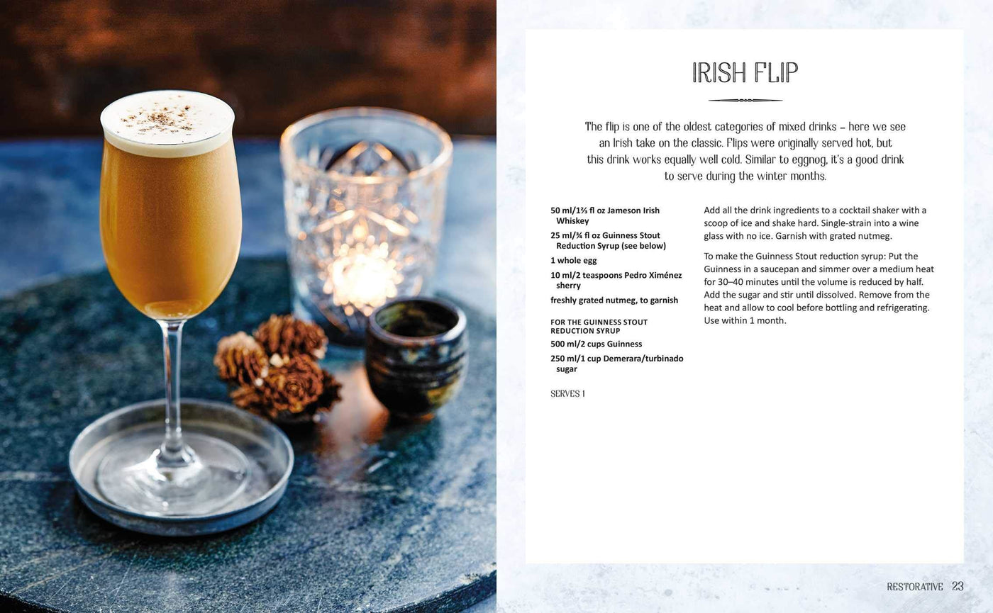 Glass of Irish Flip cocktail with a recipe on a magazine page.