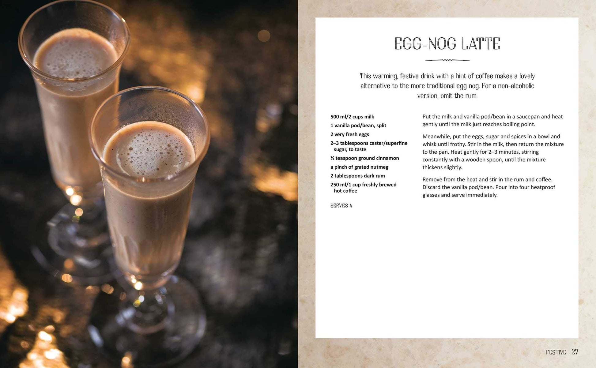 Two glasses of egg nog latte with a recipe card on a textured surface