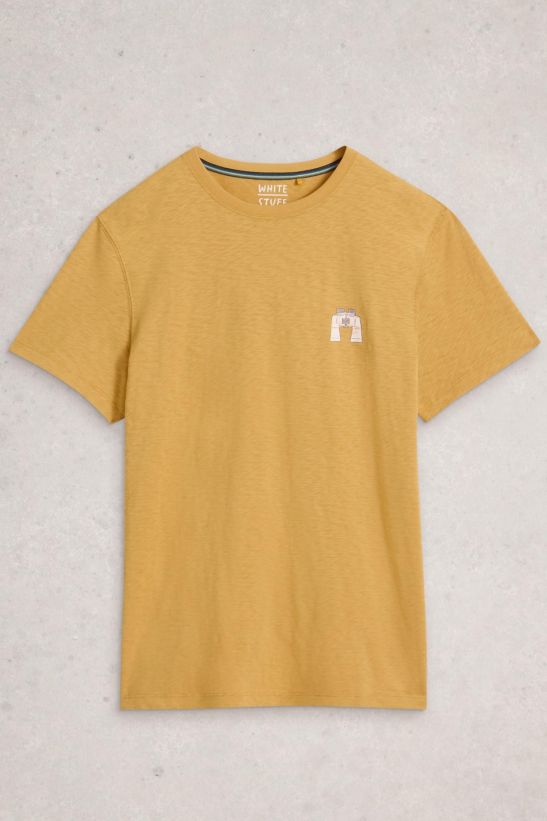Yellow cotton t-shirt with a small logo on a light gray background