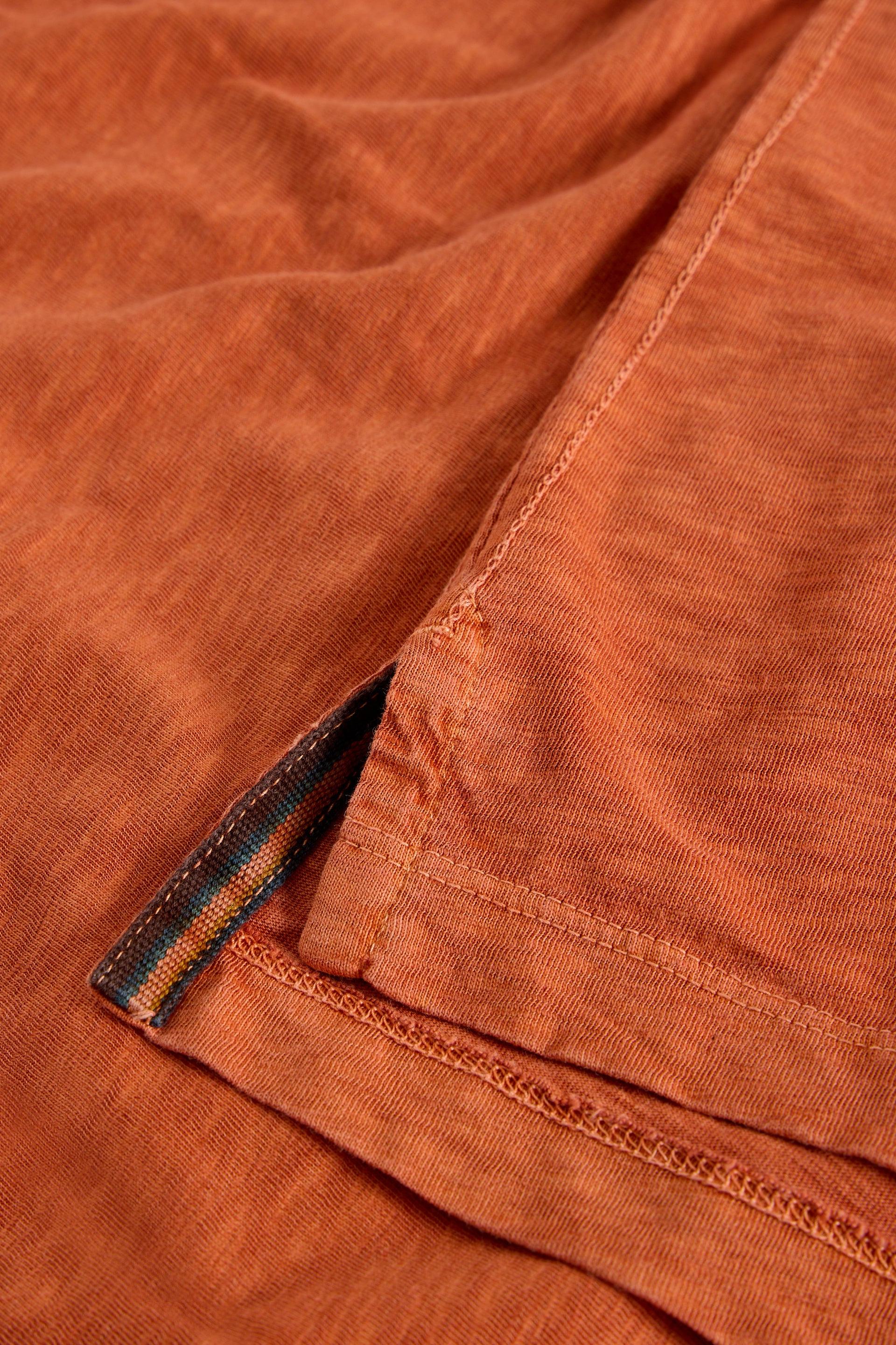 Close up of split detail on hem.