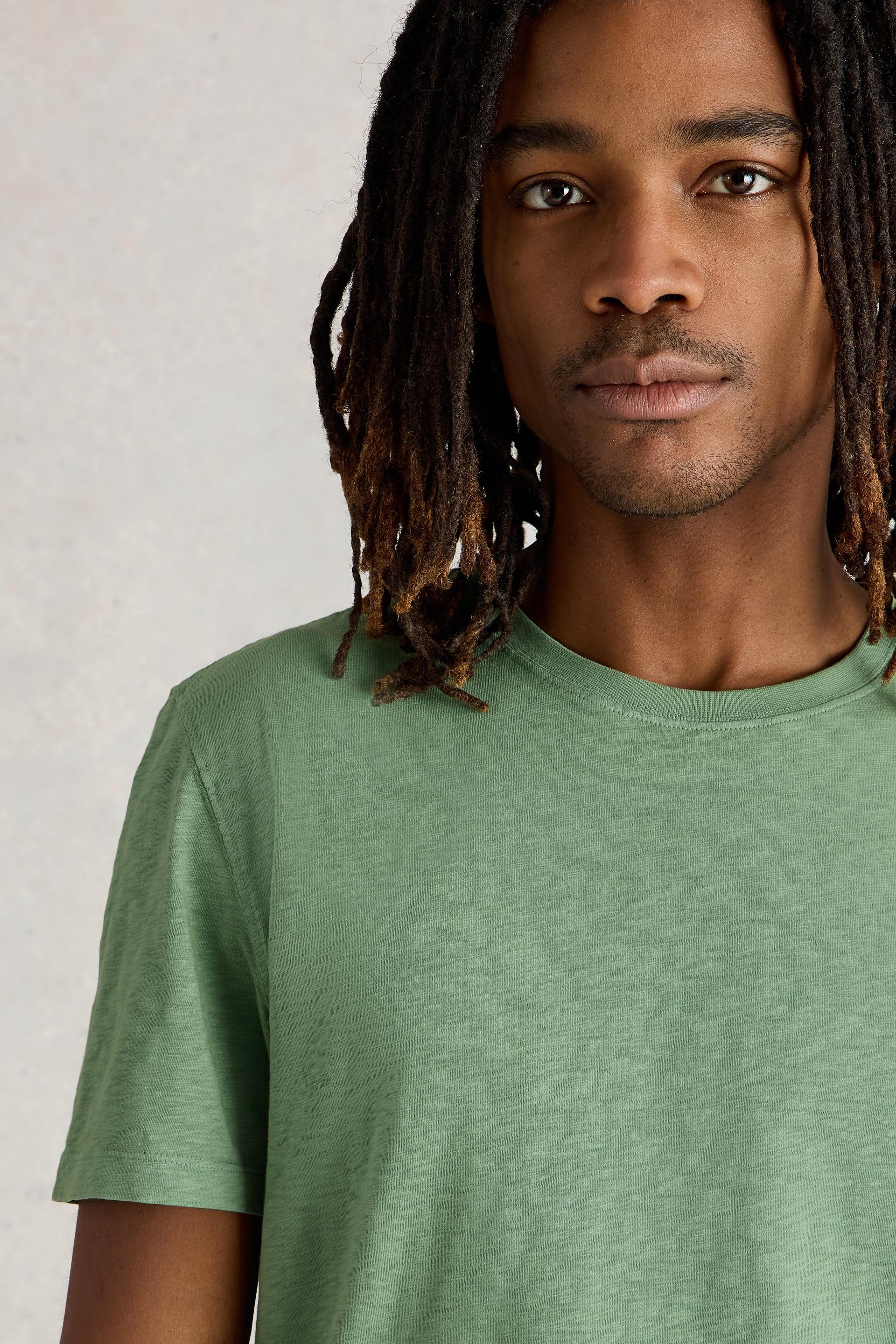 Close up of crew neck and short sleeve