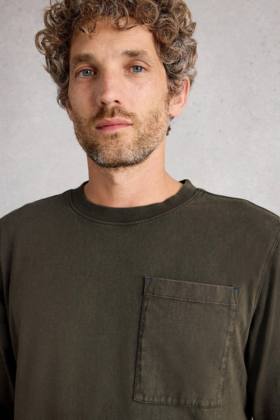 Close up of long sleeve green organic cotton t-shirt with crew neck and large front pocket