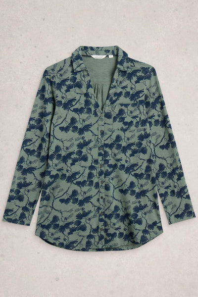 Flat lay of green Annie longline tunic with blue floral print, made from 100% cotton, featuring collar, long sleeves, and pocket