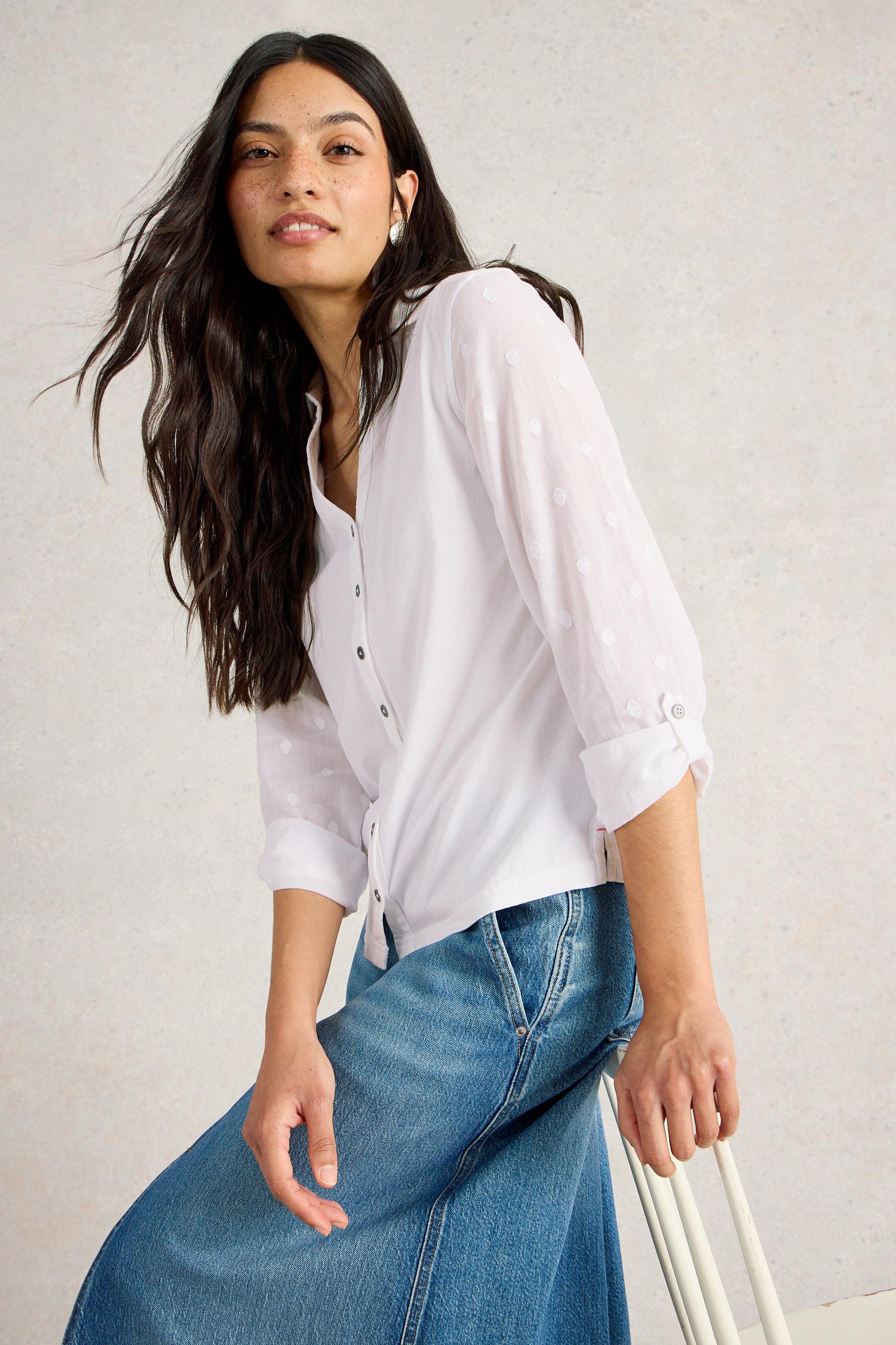Model wearing White Stuff Annie Mix Jersey Shirt in Pale Ivory, highlighting the button-down design, collar, and turn-up-able sleeves.