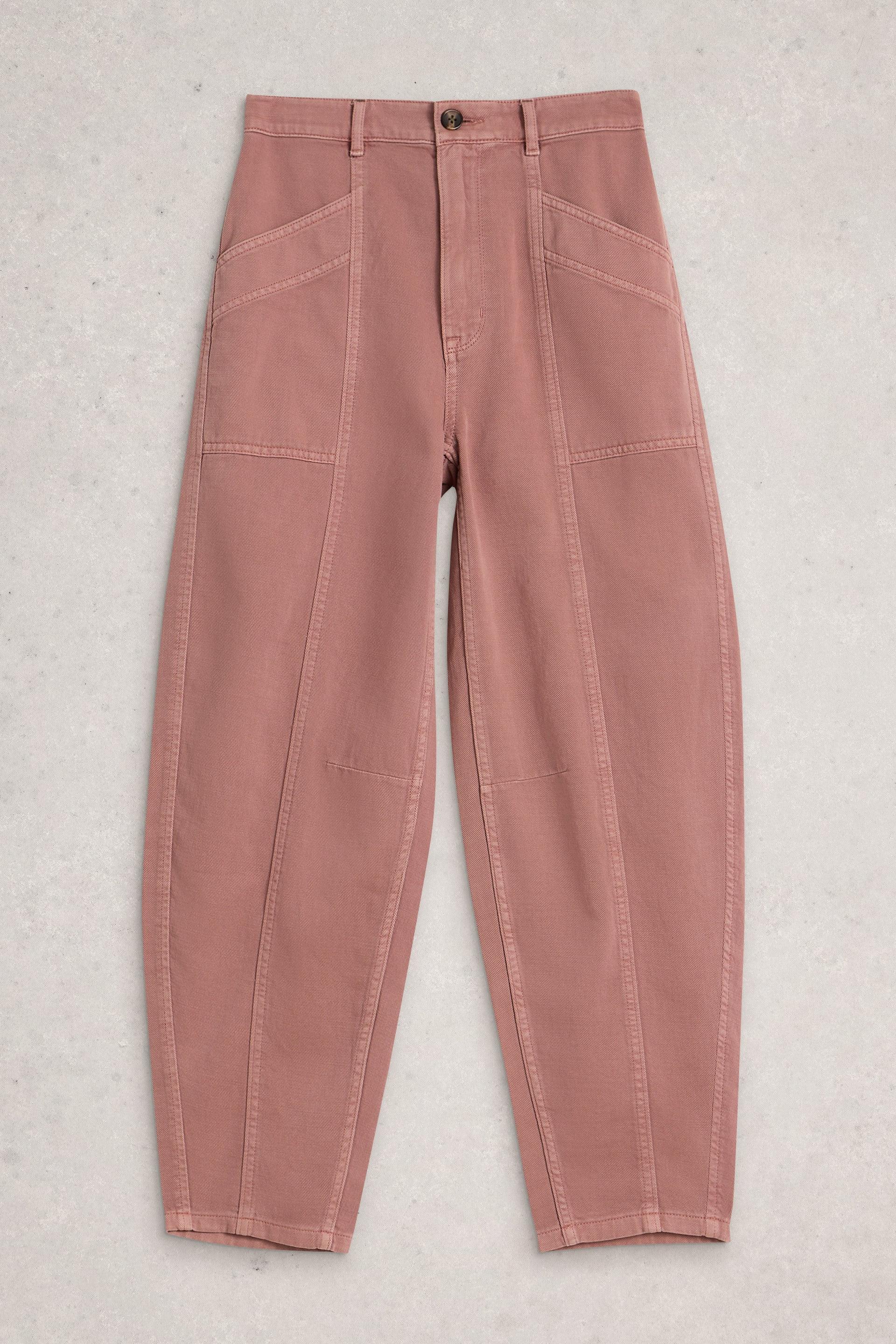Pink barrel leg trousers on a light gray background