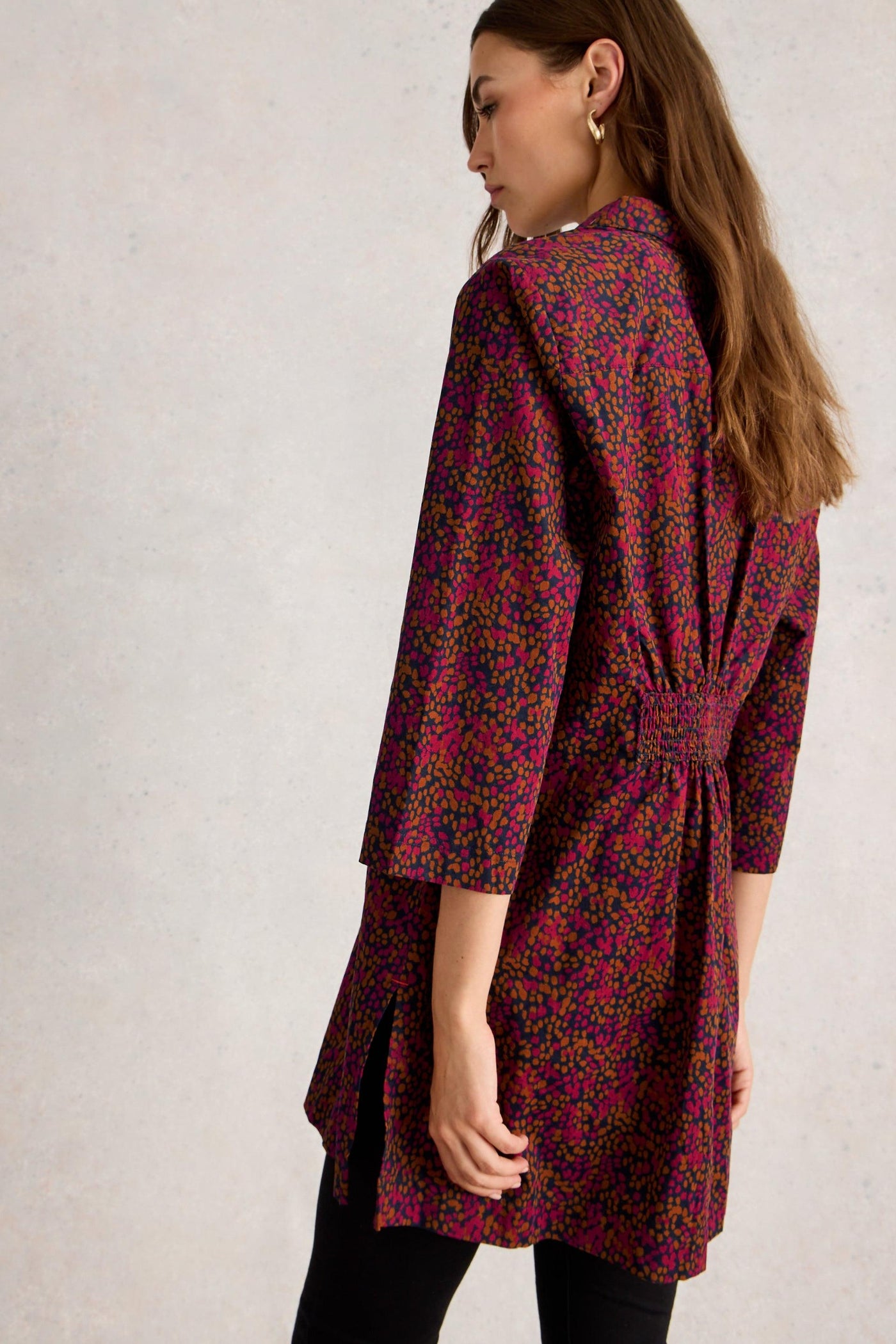 Back view of organic cotton tunic showing 3/4 sleeves and ruched detail 