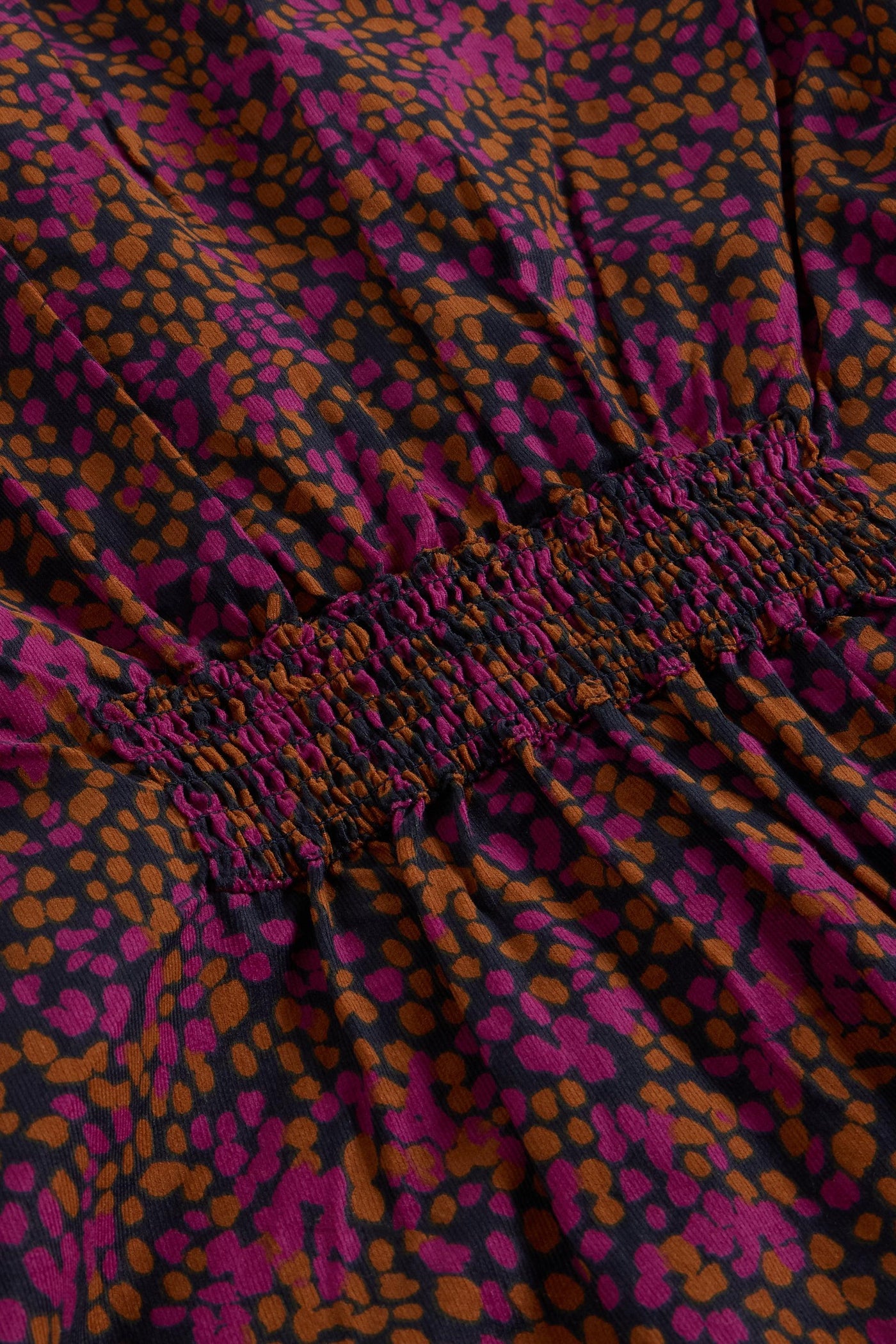 Close up of ruched detail on cord organic cotton tunic